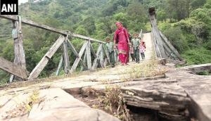 Jammu and Kashmir: Locals risk lives by crossing damaged bridge