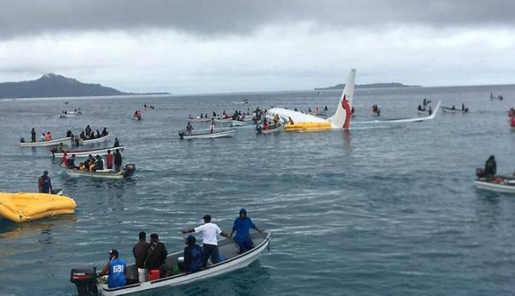 Air Niugini plane overshoots runway and crashes into the Pacific Ocean in Micronesia; passengers swim for their lives