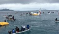 Air Niugini plane overshoots runway and crashes into the Pacific Ocean in Micronesia; passengers swim for their lives