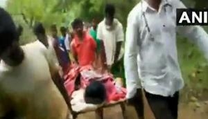 Odisha: Shocking! Ailing local carried on cot to hospital due to inadequate infrastructure