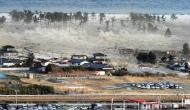 Tsunami and earthquake in Indonesia kill over 400