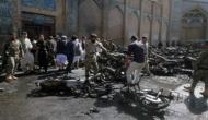 Afghan official: 14 killed in bombing at candidate rally