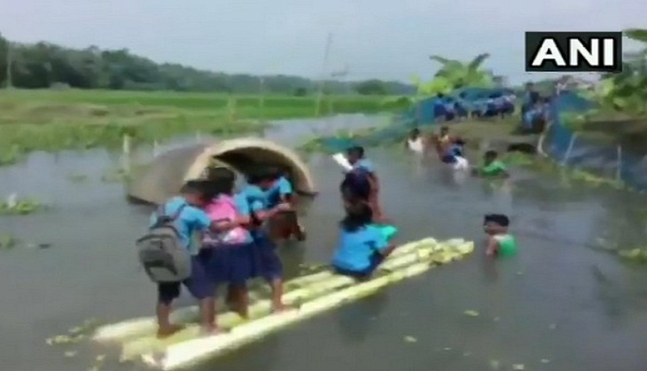 In absence of bridge, these Assam kids swim daily to reach school