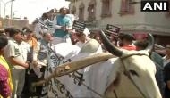Delhi: Vijay Goel rides a bullock cart in Chandni Chowk to protest against fuel prices hike; confronts Kejriwal