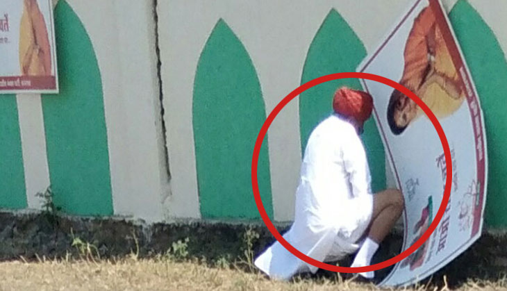 Rajasthan Minister urinate in public near a poster featuring CM Vasundhara Raje, photo goes viral; calls it 'old-age tradition'