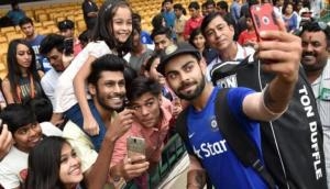 OMG! Here’s how Virat Kohli reacted when a crazy fan breached him while he was fielding during the match; see video