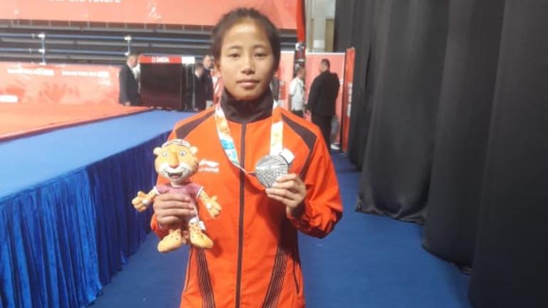 Youth Olympics silver medallist Thangjam Tababi Devi donates competition dress to IOC Museum