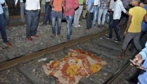 Girl commits suicide by jumping before train