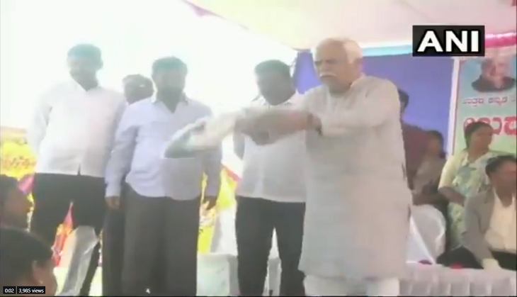 Watch: Karnataka Revenue Minister RV Deshpande throws sports kit from stage at the athletes in Karwar's Haliyala