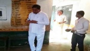 Watch video: Chhattisgarh BJP candidate Dayaldas Baghel worships EVM, perform 'Parikrama' and break the coconut before casting his vote