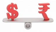 Rupee inches up 2 paise to 71.22 against the US dollar amid a dip in crude oil prices 