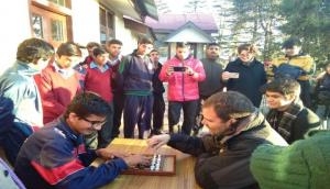 Shimla: Rahul Gandhi plays chess with specially-abled kids as nephew watches on