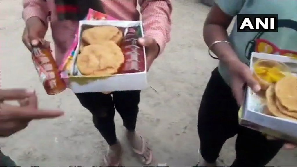 Caught On Camera: At temple event in UP BJP lawmaker, liquor bottles served with food packets; video goes viral