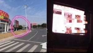 Viral Video: Oops! Employee plays porns for 90-minutes on advertising big display on the busy road and…!
