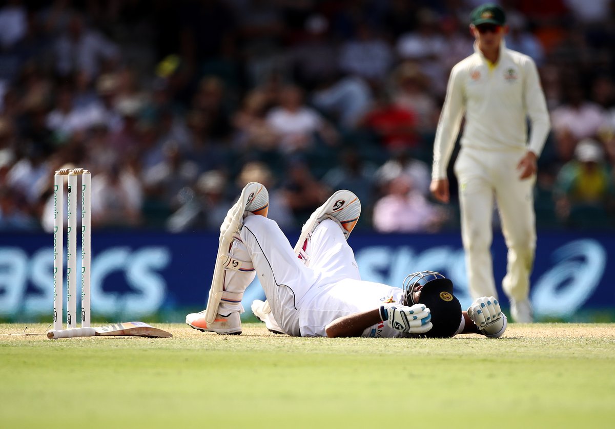 OMG! Dimuth Karunaratne taken to hospital after being struck by a fiery bouncer from Pat Cummins