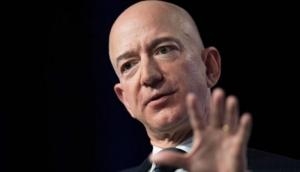 Amazon CEO Jeff Bezos accuses the US tabloid after receiving threats to publish his intimate photos, texts