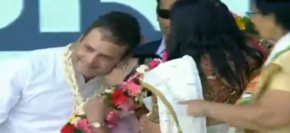 Watch: Rahul Gandhi gets a special gift on Valentine’s Day, woman ‘kisses’ him on stage during Gujarat rally; video goes viral