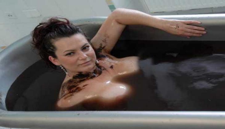 Bathing in Crude oil
