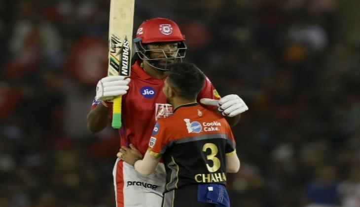 Chris Gayle and yuzvendra Chahal on field Bromance