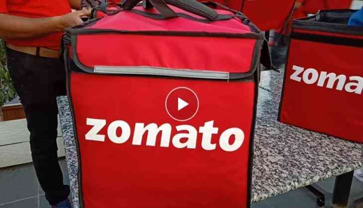 Check how Zomato delivery boys standing in a long queue outside