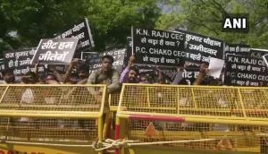 Supporters of Raj Kumar Chauhan protest outside Rahul Gandhi's residence