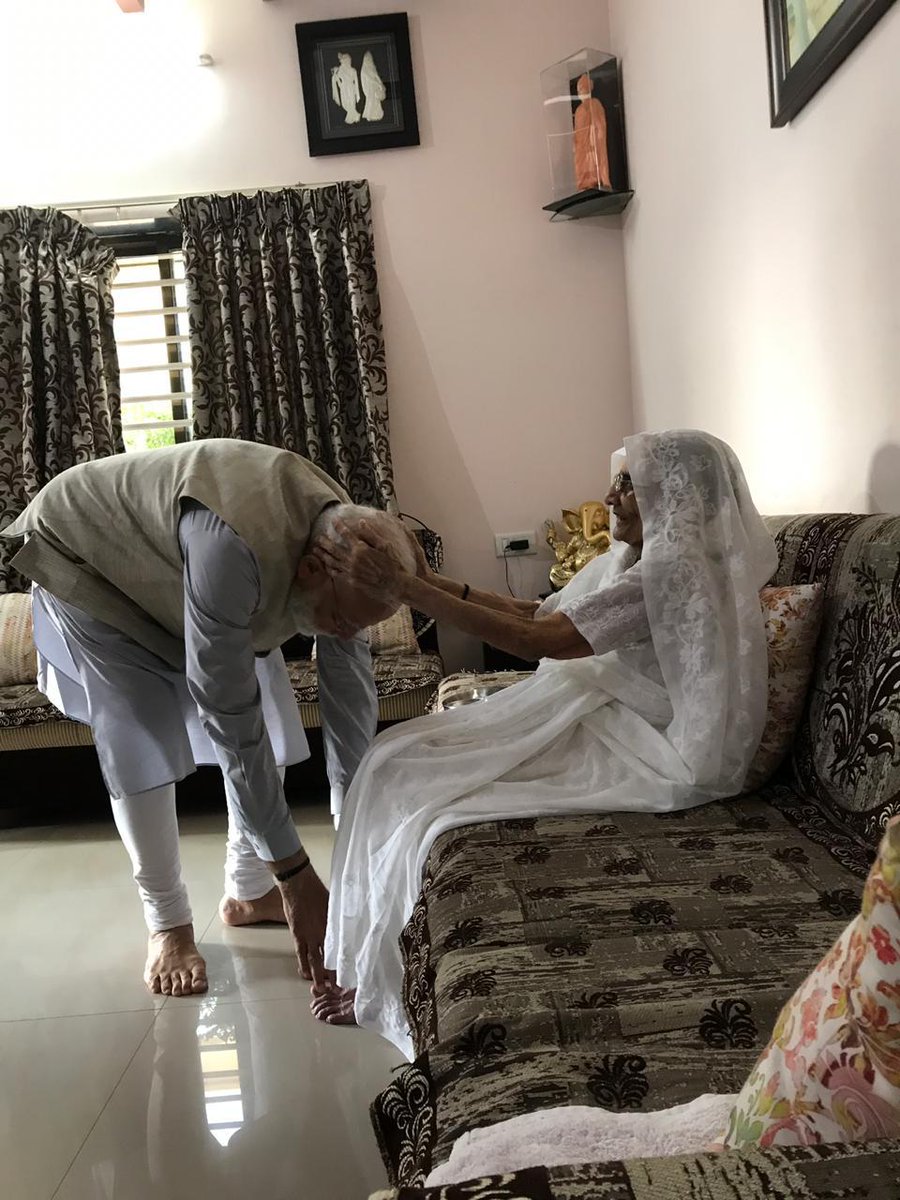 PM Narendra Modi seeks blessings of his mother before casting vote