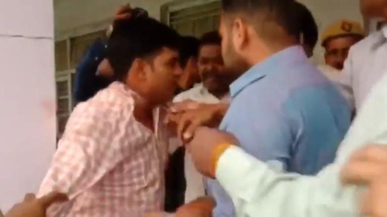 Watch: BJP workers beat up poll officer in Moradabad as he allegedly asked voters to press 'cycle' button