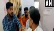 Watch: BJP workers thrash NCP man for showing black flag to Sadhvi Pragya during roadshow