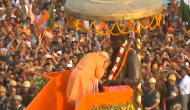 Modi chants echo in Varanasi as Prime Minister's road show turns city into 'saffron tsunami'