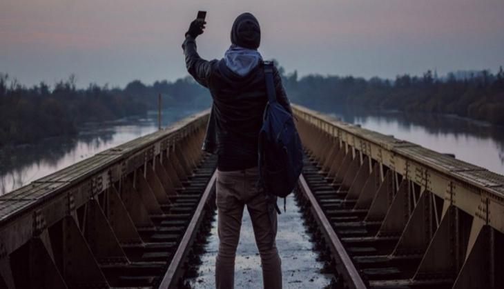 Shocker: 2 Killed, 1 injured after train hits them while taking selfie near railway bridge