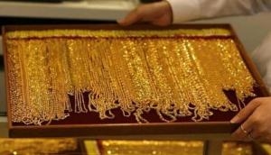 Gold slides Rs 150 on muted demand
