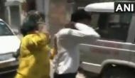 Woman thrashes man posing as anti-corruption bureau officer, demanding 50,000 rupees; video goes viral