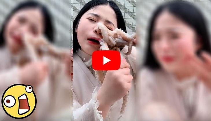 Scary! Woman tries to eat an octopus alive; what happens
