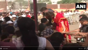 Watch: Priyanka Gandhi climbs barricade to greet supporters in Madhya Pradesh's Ratlam