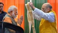 Amit Shah congratulates PM Modi on entering 20th year of public service