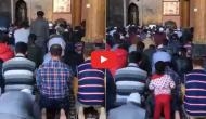 Watch how little girl in Kashmir climbs on to dad's back while praying in the mosque; see the cutest video