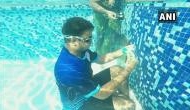 Guinness Book of World Records: 20 year old solves Rubik's cube under water in Mumbai