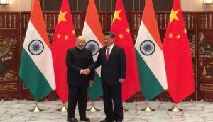 PM Modi meets Chinese President Xi Jinping  in Bishkek