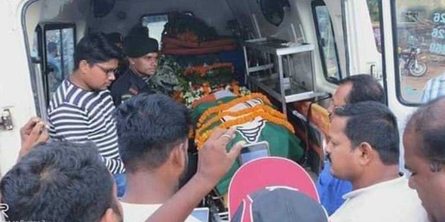 BJD suspends three party workers for draping martyr's body in party flag