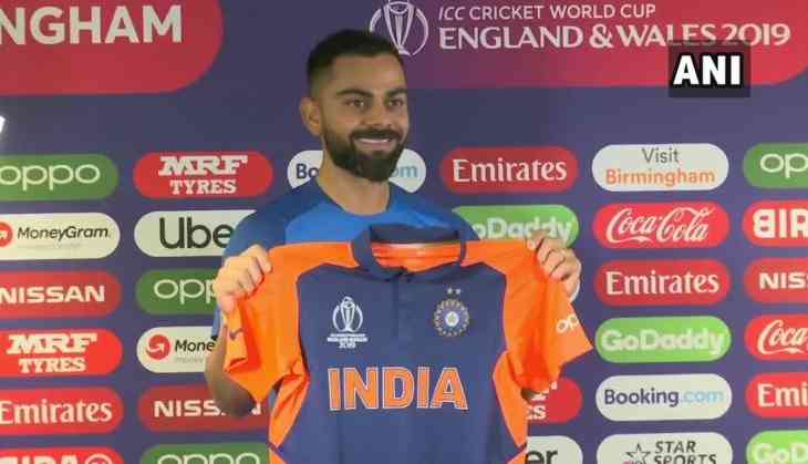 Virat Kohli's first reaction on team India's new orange jersey | Catch News