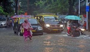 Heavy rain in Mumbai after dry spell; trains, road traffic hit