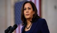 Kamala Harris apologises for laughing after a questioner called Donald Trump 'mentally retarded'