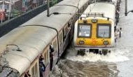 Mumbai rains: Amid heavy downpour, suburban trains suspended