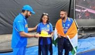 Rohit Sharma presents autographed hat to fan, who was hit by ball