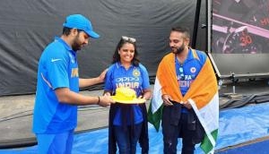Rohit Sharma presents autographed hat to fan, who was hit by ball