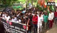 Karnataka crisis: Youth Congress workers take out protest march against BJP