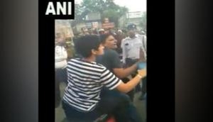 Delhi: Stopped for riding without helmet, woman clashes with cop; 2 arrested