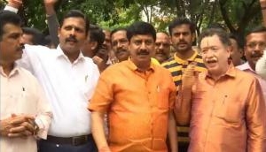 Karnataka: BJP workers celebrate outside Yeddyurappa's residence