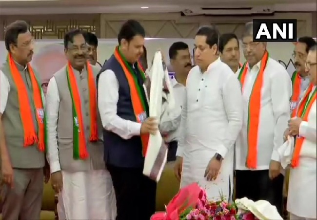 3 NCP, 1 Congress leaders join BJP in presence of CM Devendra Fadnavis