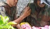 Army personnel rescue newborn baby in Kerala's worst flood-hit Wayanad